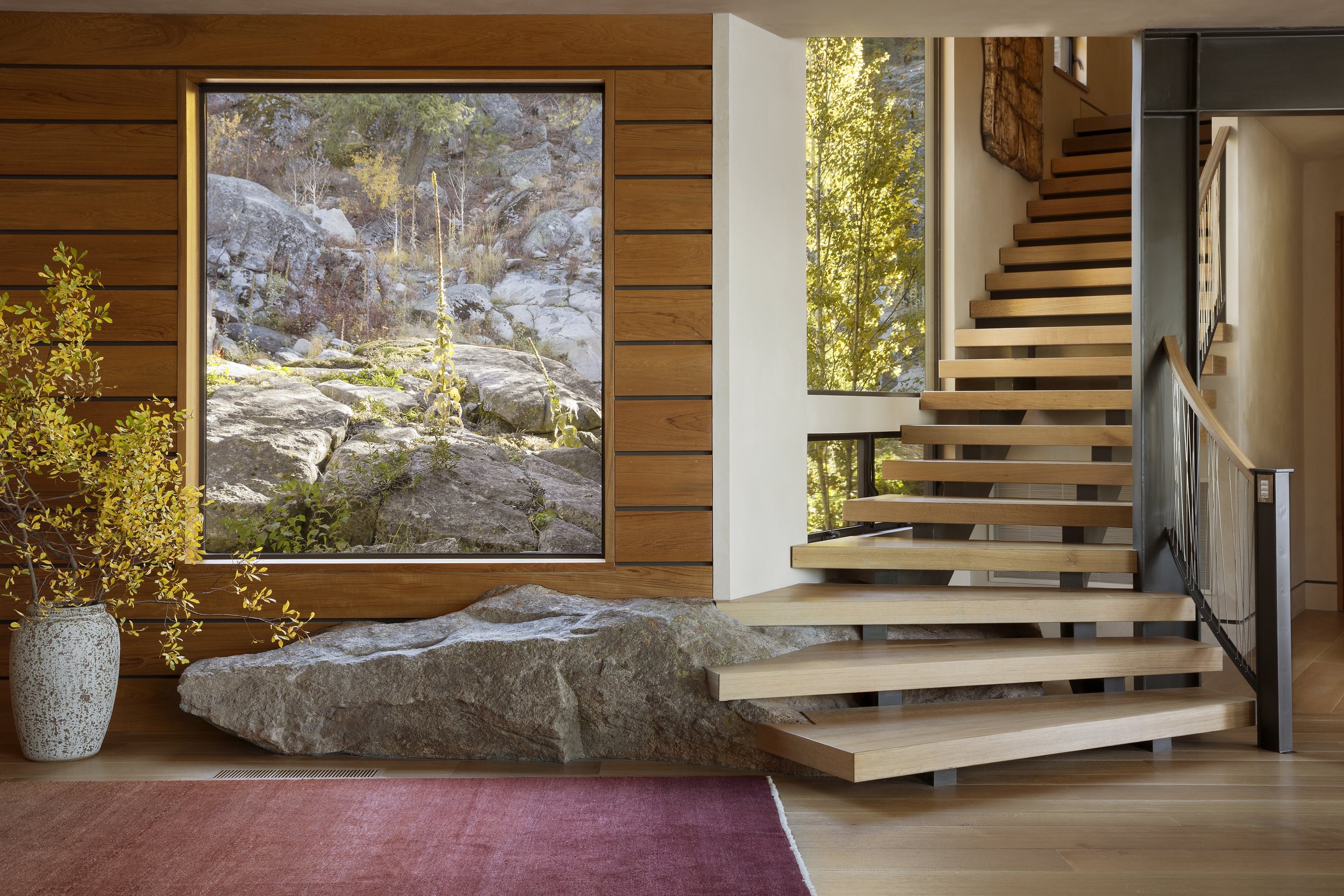 Modern Cabin Interior with Floating Staircase in McCall, Idaho