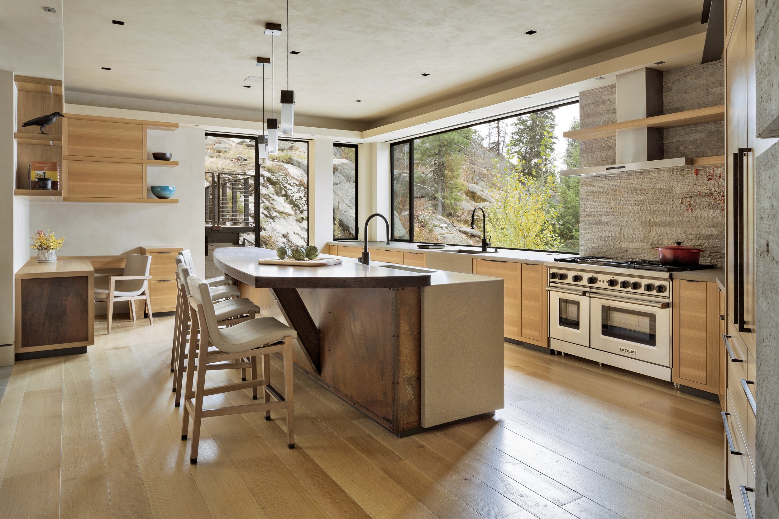 Modern Kitchen with Large Island and Forest Views in McCall, Idaho Home
