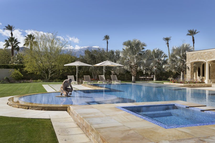 Luxury Swimming Pool with Sculpture in Palm Desert, CA Home