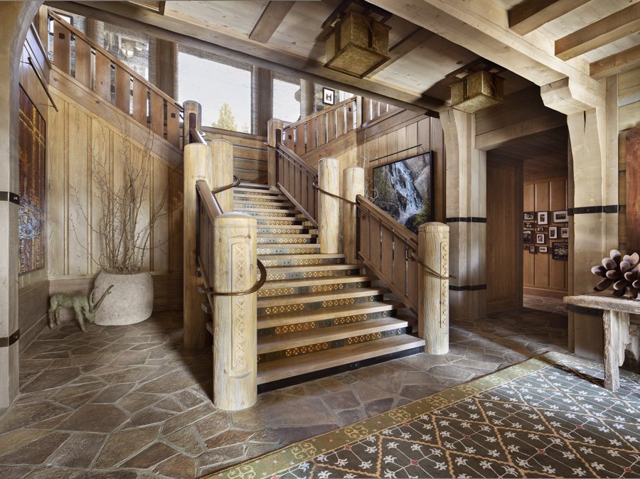 Stunning Rustic Staircase Design by Brown Design Group in Mammoth Lakes, CA