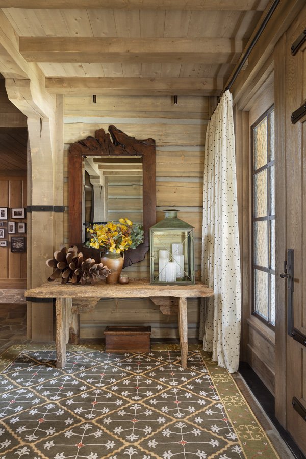 Charming Rustic Entryway Decor by Brown Design Group in Mammoth Lakes, CA