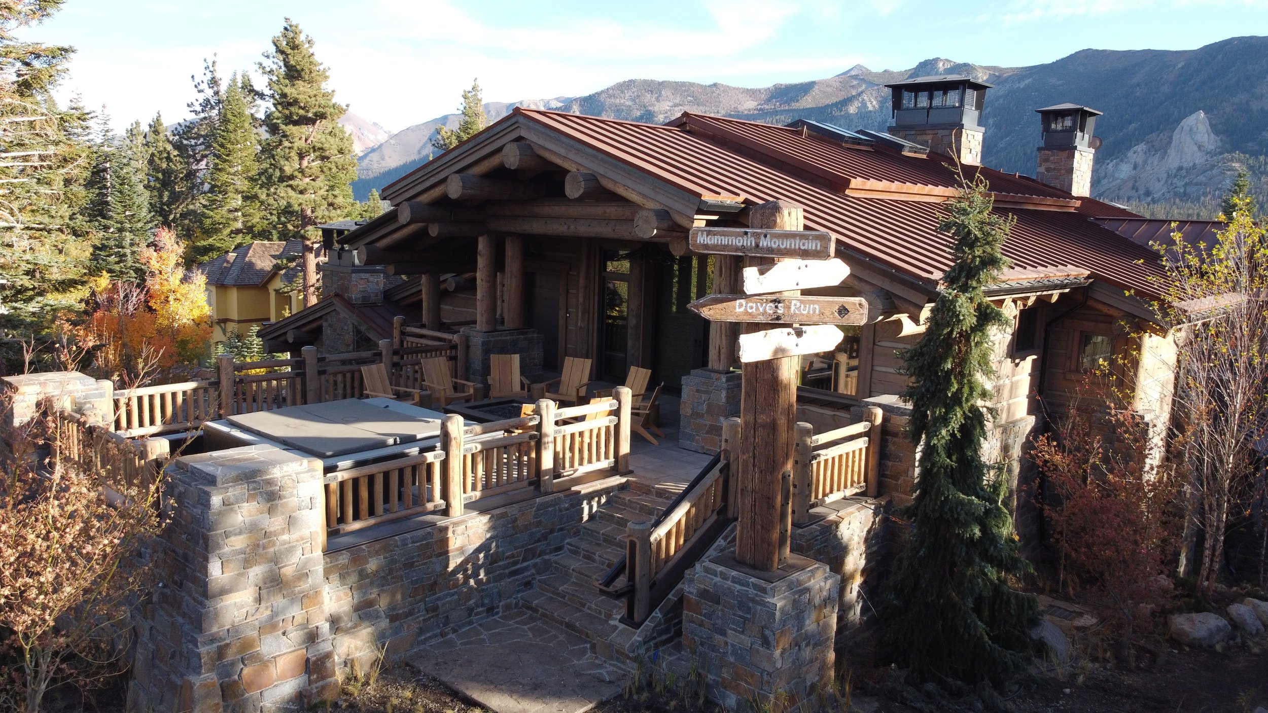 Aerial Perspective of Mountain Home in Fall Mammoth Sign in Mammoth Lakes, CA