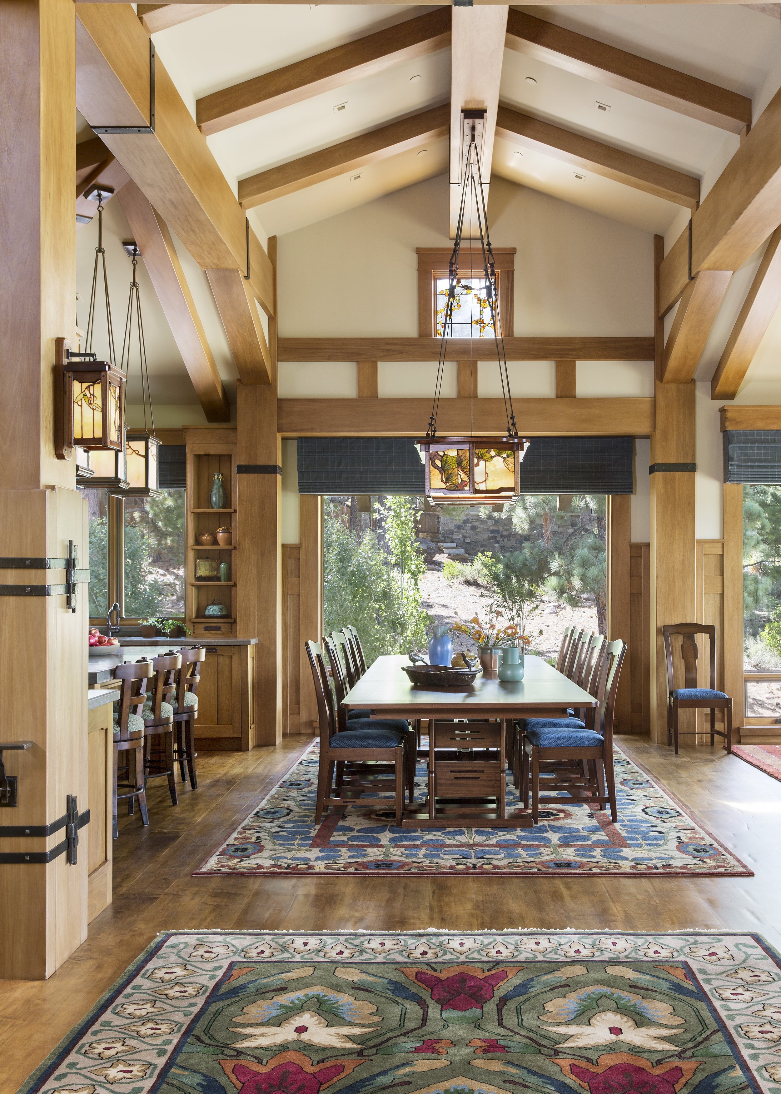 Elegant Dining Room with Natural Light and Modern Chandelier in Martis Camp Tahoe, CA