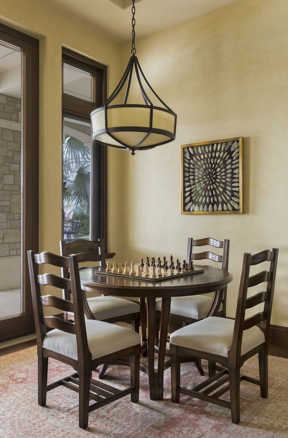 Custom Game Room with Round Dining Table and Chandelier in McCall, Idaho