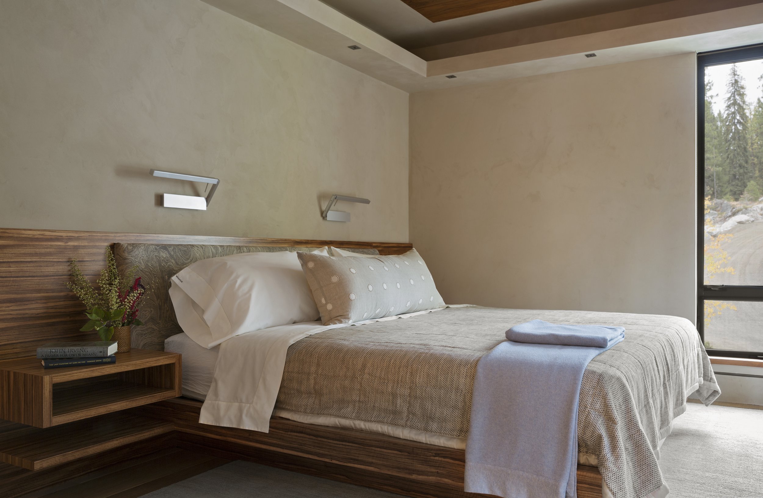 Modern Bedroom with Wood Accents and Lake View in McCall, Idaho Home