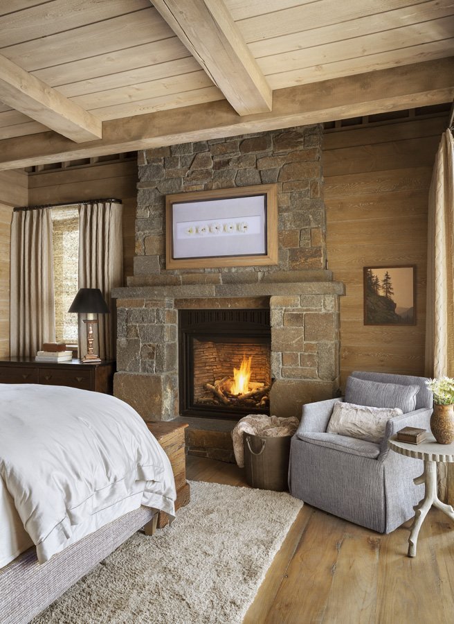Modern Rustic Bedroom Seating Area and Fur Bedding in Mammoth Lakes, CA