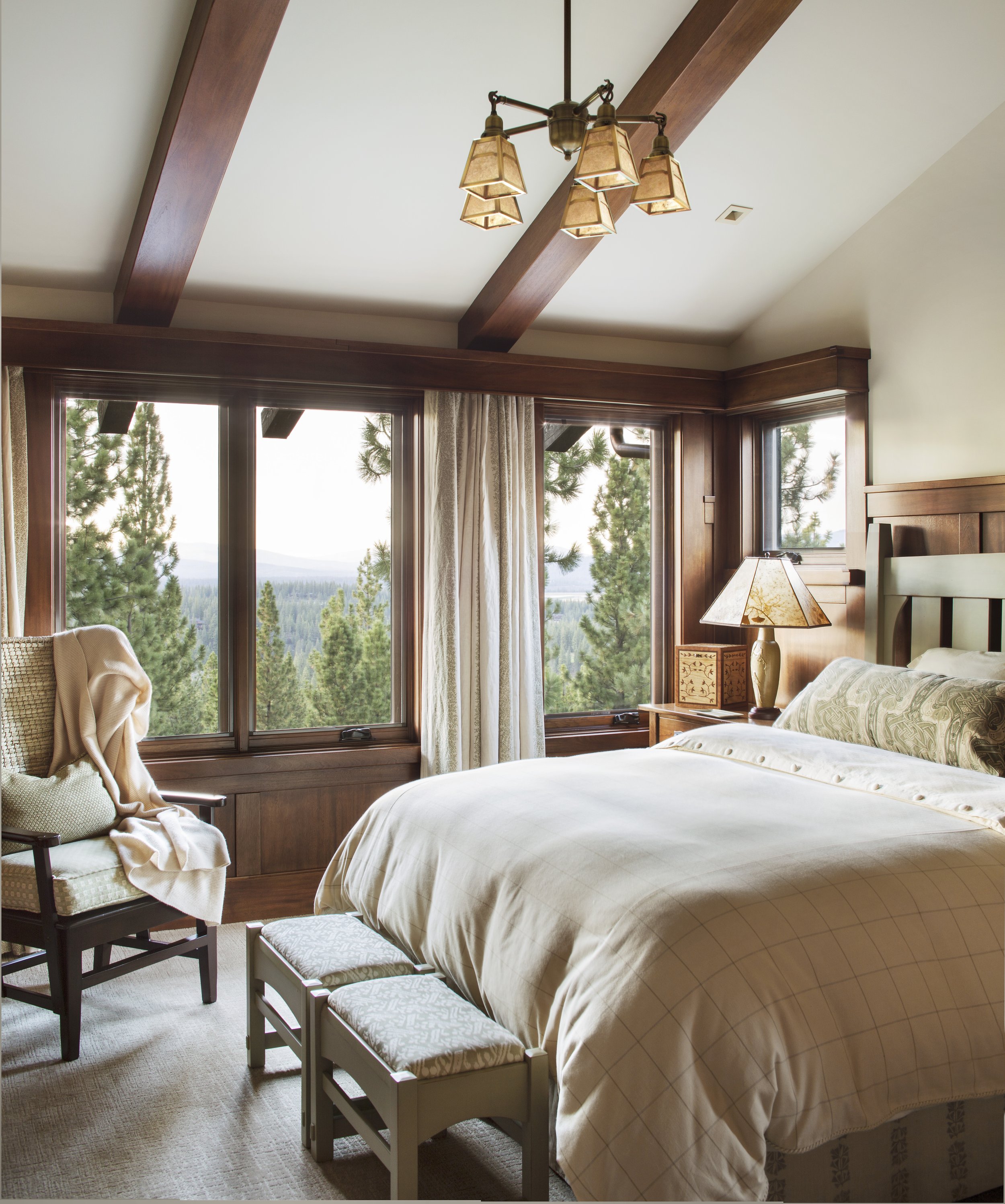 Guest Bedroom with Seating Area and Large Windows in Martis Camp Tahoe, CA