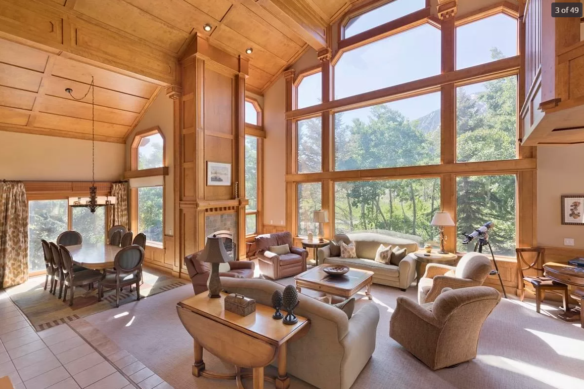 before-remodel-mammoth-lakes-rustic-living-room-large-windows.png