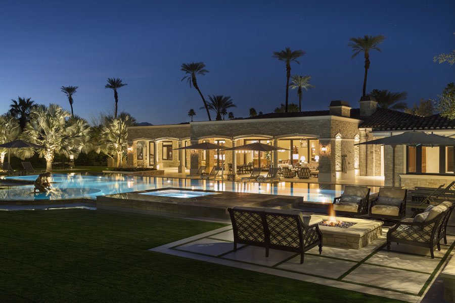 Luxury Pool Area at Night in Palm Desert Home